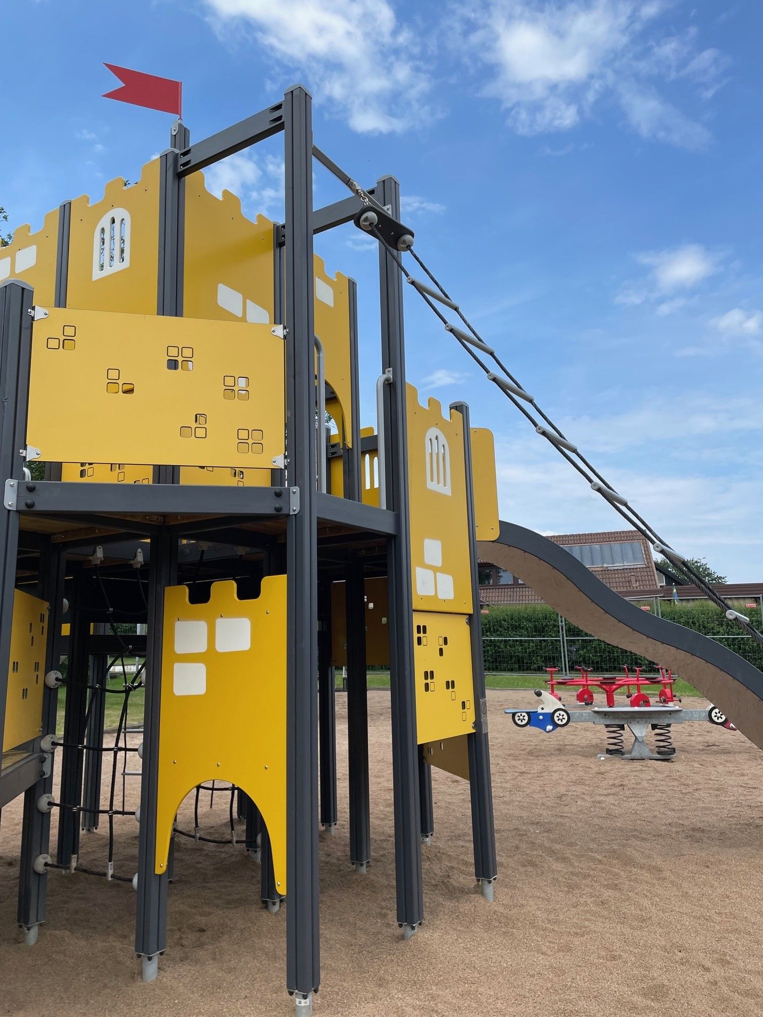 Klätterställning med rutschkana